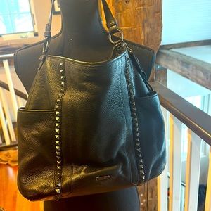 Coach leather bag like new . Used 1 day